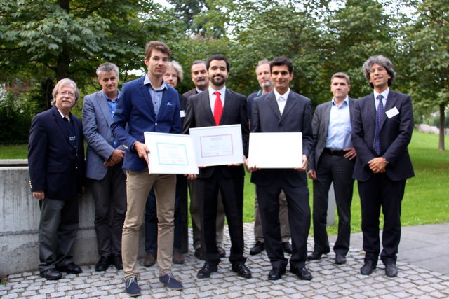 [Photo]Winners of the Awards 2014 together with the jury: Front (left to right): Štěpán Mráček, Marcos Martinez Diaz, Laurent El Shafey - Back (left to right): Jim Wayman, Christoph Busch, Raymond Veldhuis, Alexander Nouak, Günther Schumacher, Jean-Christophe Fondeur, Patrizio Campisi