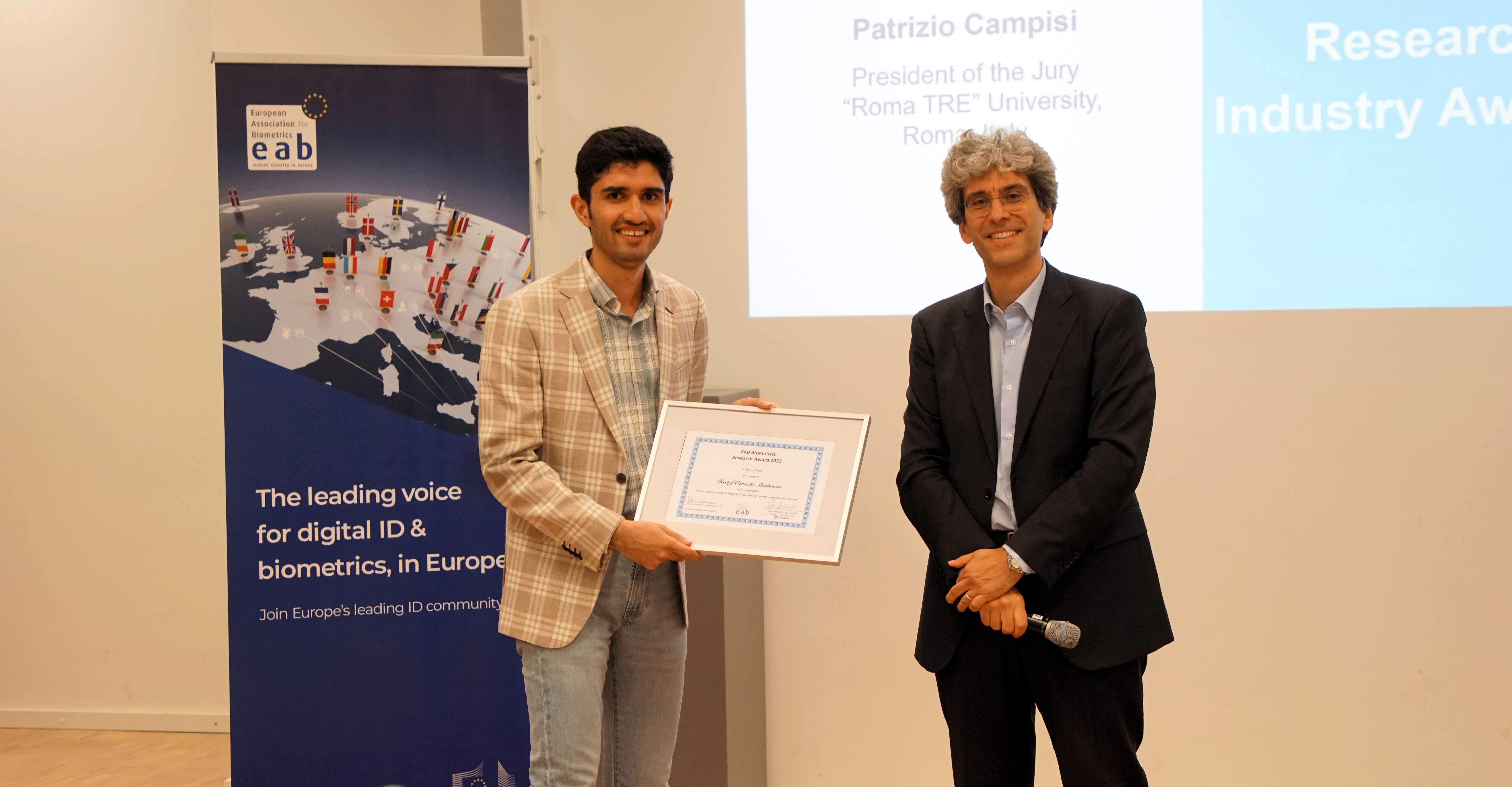 [Photo] Winner of the EAB Research Award Hatef Otroshi Shahreza with awards chair Patrizio Campisi