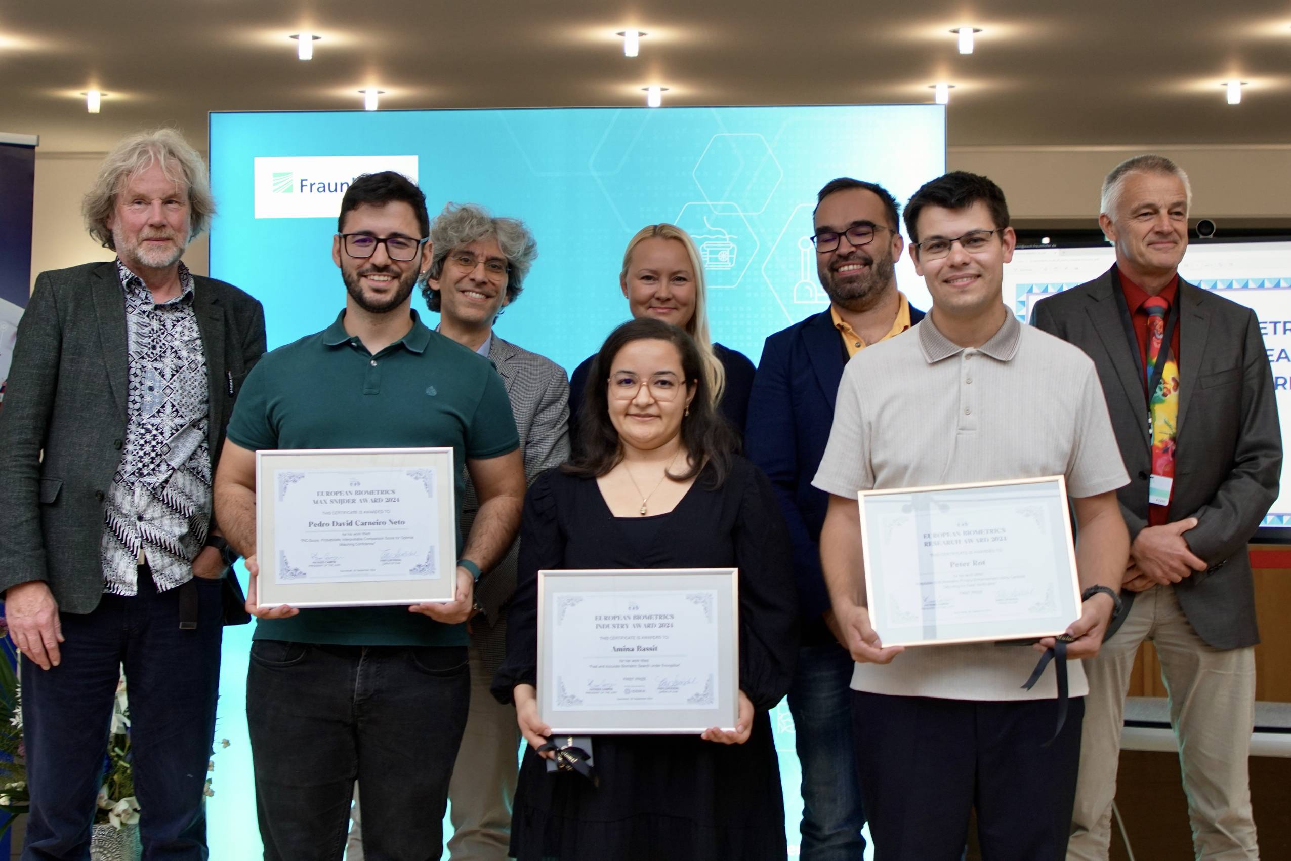 [Photo] The winners of the European Biometrics Awards 2024 alongside members of the jury and the European Association for Biometrics: (f.l.t.r.) Prof. Raymond Veldhuis, Pedro Carneiro Neto, Prof. Patrizio Campisi, Amina Bassit, Frøy Løvåsdal, Prof. Vitomir Štruc, Peter Rot, and Prof. Christoph Busch